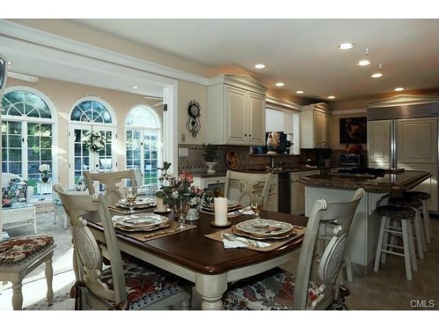 dining area/kitchen great room the kitchen is the heart of the home and this is one big heart.