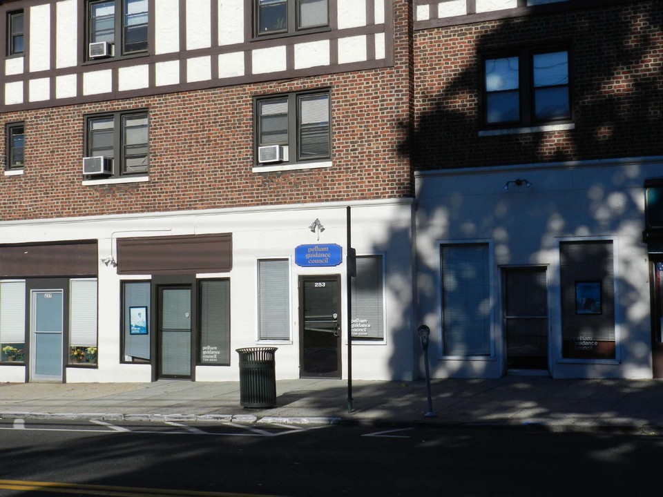 storefront for lease three storefronts currently combined as one space. the door with blue sign and the stores on the immediate right and left are the space for lease.
