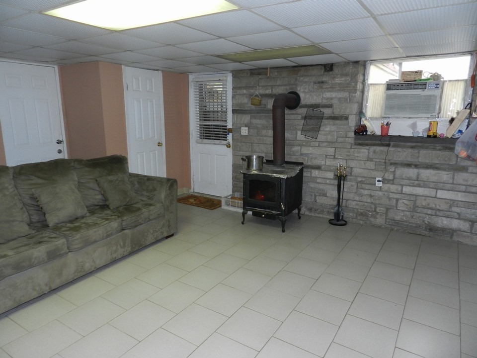 lower level family room with wood burning stove